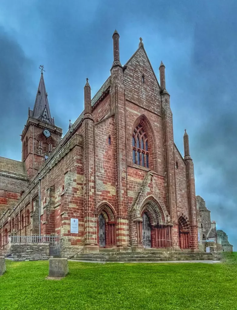 The west front of the cathedral under a cloudy sky